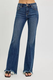 Front view of the DARK RISEN Full Size Mid Rise Flare Frayed Hem Jeans Plus Size, styled with polished boutique styling for day-to-night outfits, made for women who want easy layering.