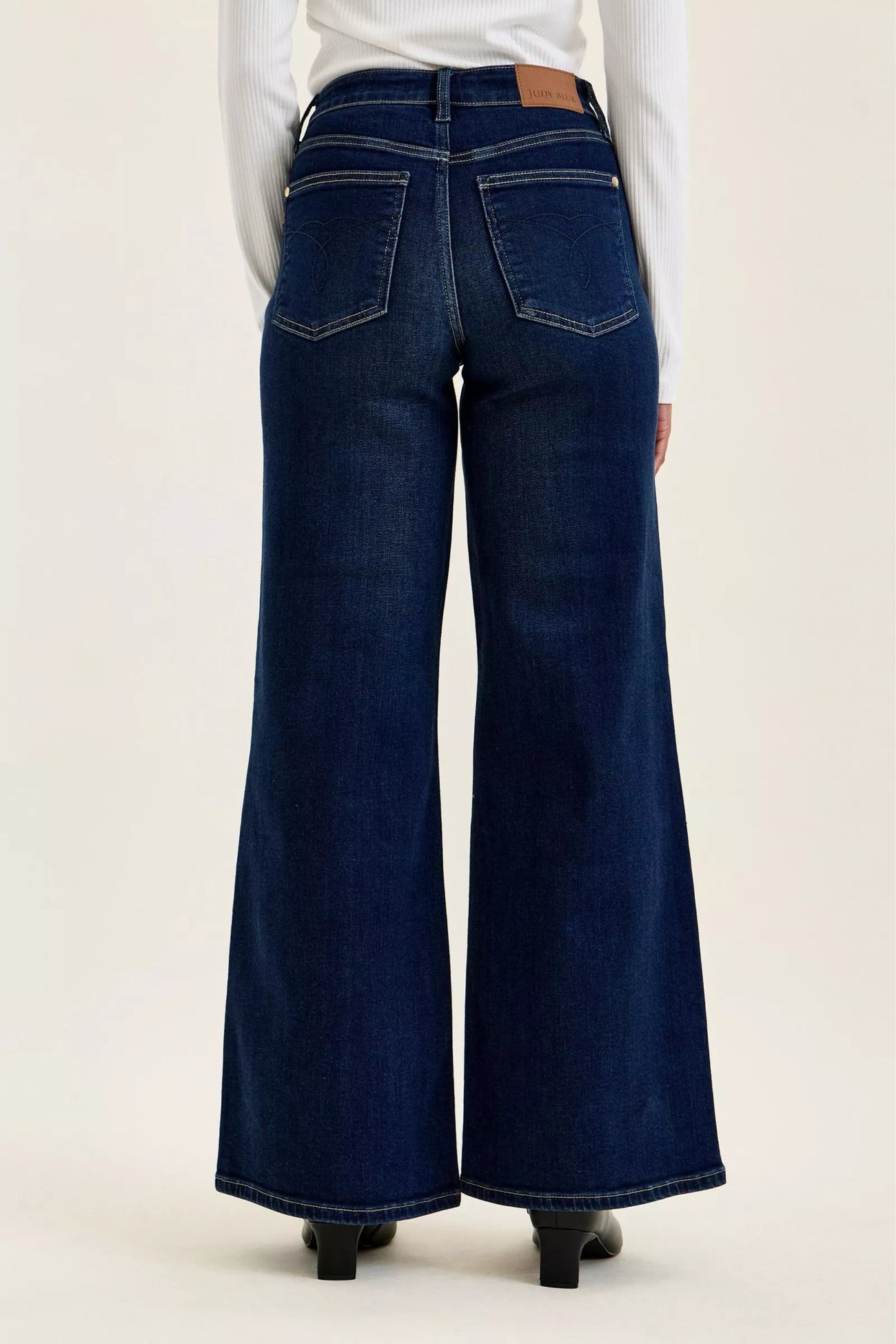 Neckline detail of the DK Judy Blue High-Waisted Wide-Leg Dark Wash Jeans, styled with polished boutique styling for day-to-night outfits, made for women who want easy layering.