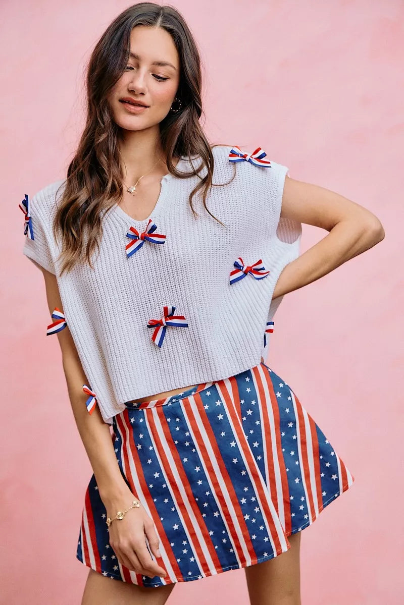 Fabric detail of the OFF WHITE SO ME 4th Of July Ribbon Trimmed Dolman Sweater Top, styled with polished boutique styling for day-to-night outfits, made for women who want easy layering.