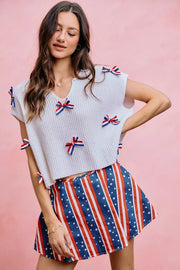Fabric detail of the OFF WHITE SO ME 4th Of July Ribbon Trimmed Dolman Sweater Top, styled with polished boutique styling for day-to-night outfits, made for women who want easy layering.