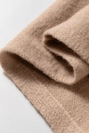 Back view of the Taupe Ribbed Trim High Neck Short Sleeve Casual Sweater, styled with polished comfort for work, travel, and everyday wear, made for women who want repeat outfit options.
