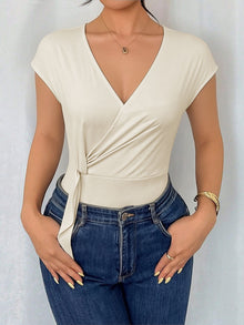 Bundle outfit view of the Apricot Women's Elegant Surplice Cap Sleeve Bodysuit for Layering & Everyday Outfits, styled with polished boutique styling for day-to-night outfits, made for women who want easy layering.