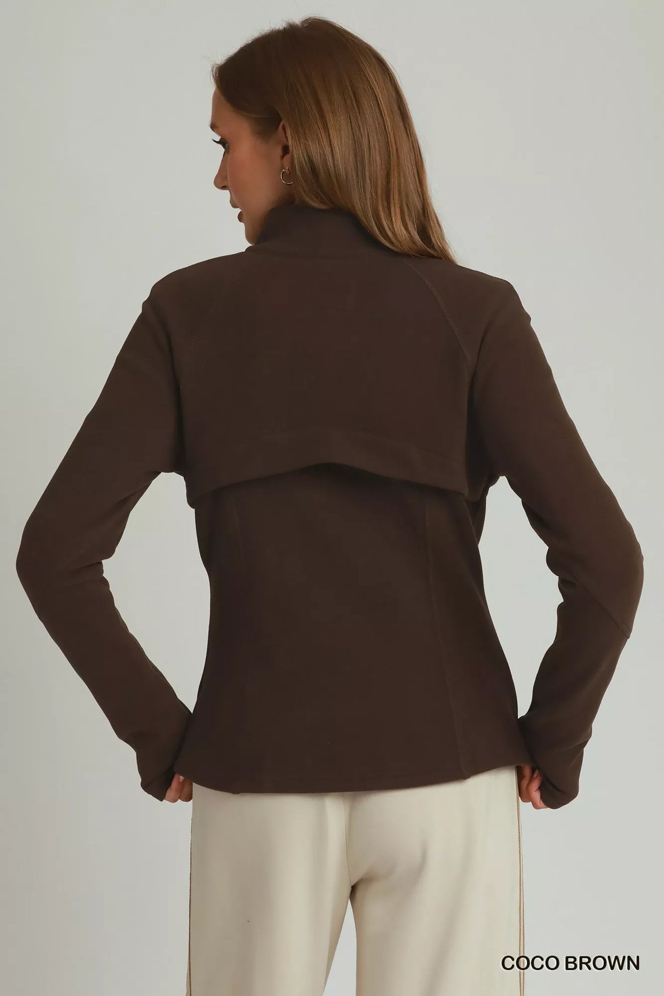 Back view of the COCO BROWN Umgee Soft Fleece Full Zip Jacket With Pockets, styled with polished boutique styling for day-to-night outfits, made for women who want easy layering.