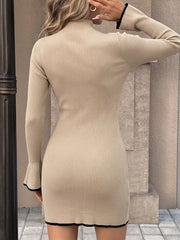 Full-length view of the Khaki Ribbed Mock Neck Flare Sleeve Sweater Dress, styled with feminine boutique styling for dinners, travel, and events, made for women who want elegant styling.