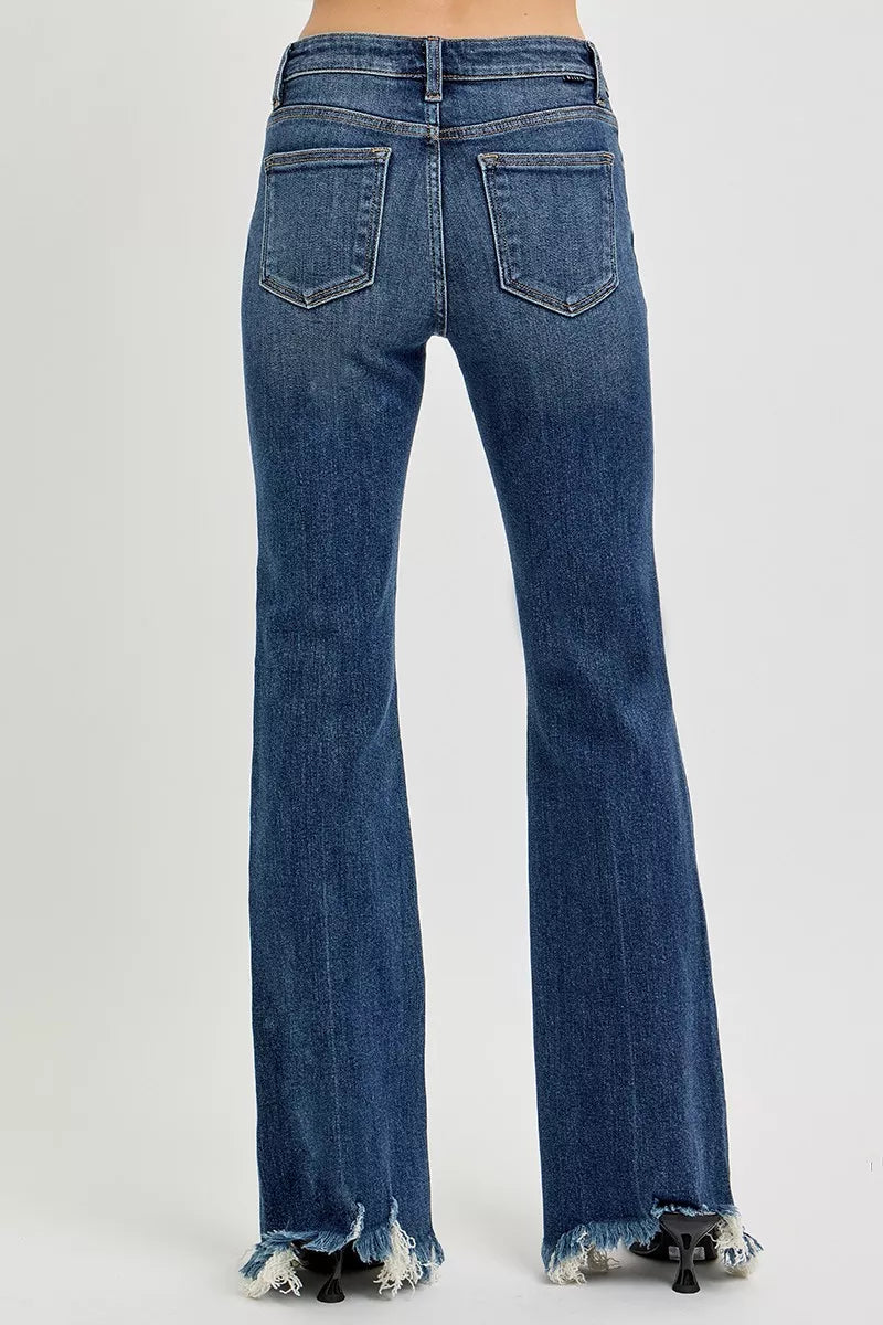 Styled outfit view of the DARK RISEN Full Size Mid Rise Flare Frayed Hem Jeans Plus Size, styled with polished boutique styling for day-to-night outfits, made for women who want easy layering.