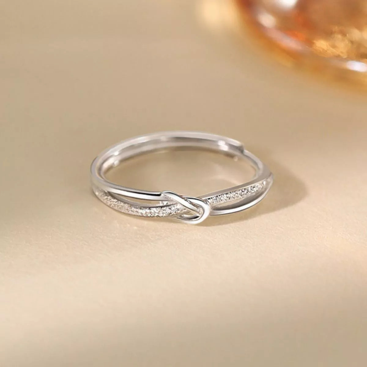 Gift-ready view of the Women's Silver Minimalist 925 Sterling Knot Ring for Everyday Styling & Gifting, styled with delicate sparkle for daily wear and gifting, made for women who want refined jewelry.