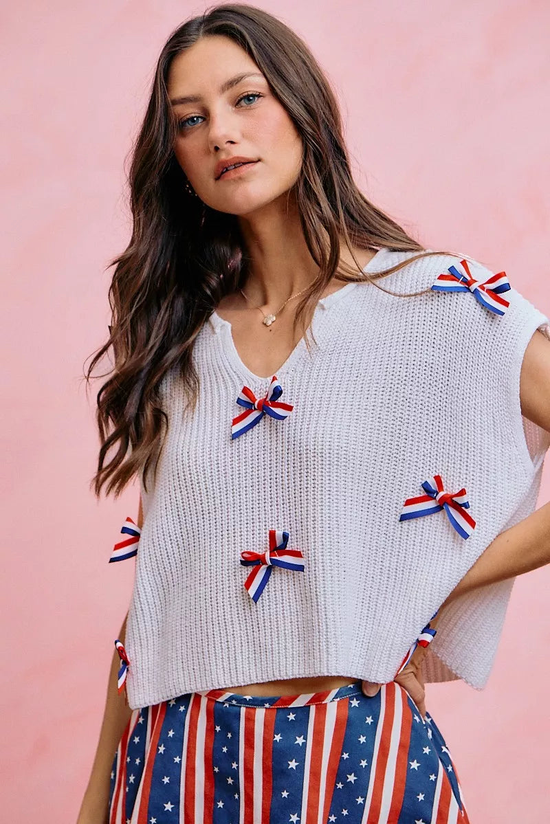 Side view of the OFF WHITE SO ME 4th Of July Ribbon Trimmed Dolman Sweater Top, styled with polished boutique styling for day-to-night outfits, made for women who want easy layering.
