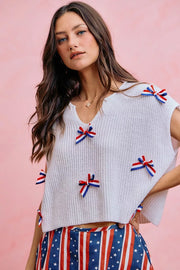 Side view of the OFF WHITE SO ME 4th Of July Ribbon Trimmed Dolman Sweater Top, styled with polished boutique styling for day-to-night outfits, made for women who want easy layering.