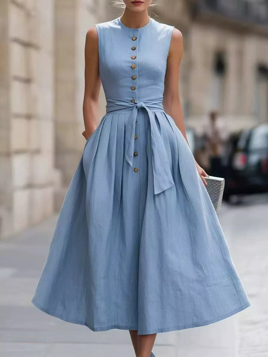 Front view of the Sea blue Full Size Sleeveless Button-Front Belted Midi Dress Plus Size, styled with feminine boutique styling for dinners, travel, and events, made for women who want elegant styling.