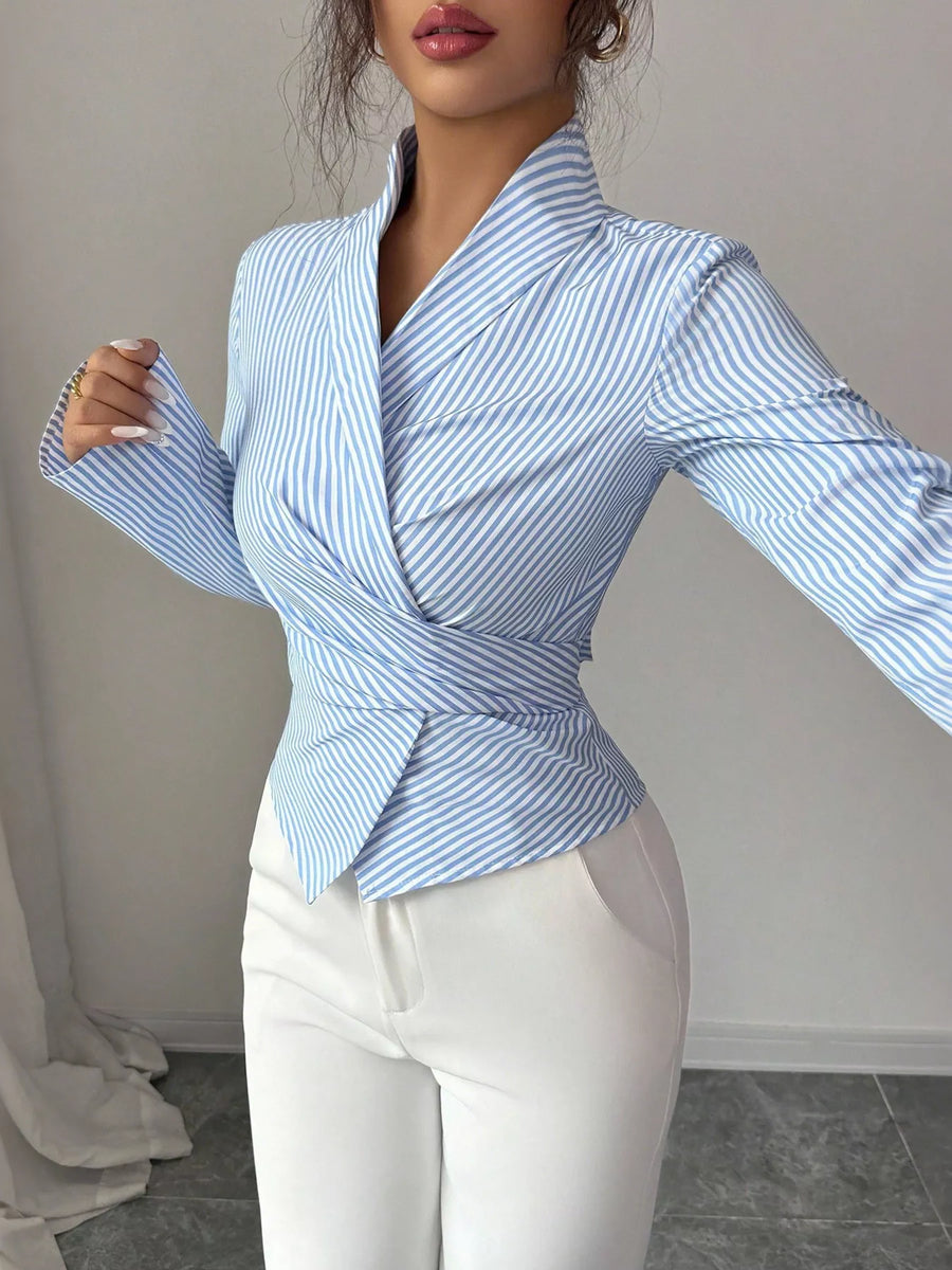 Front view of the Blue Striped Long Sleeve Wrap Blouse, styled with polished boutique styling for day-to-night outfits, made for women who want easy layering.