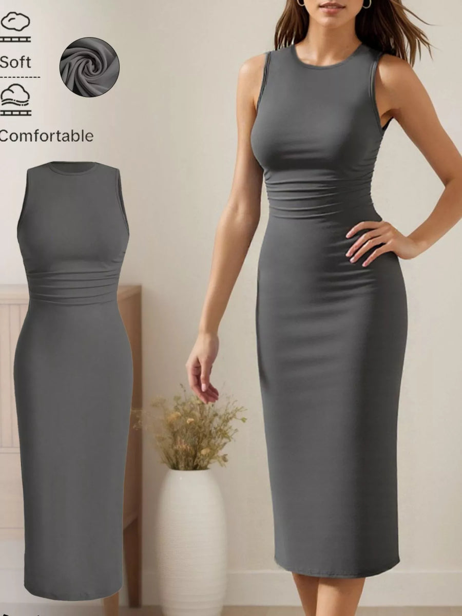 Front view of the Grey Sleeveless Round Neck Midi Dress, styled with feminine boutique styling for dinners, travel, and events, made for women who want elegant styling.