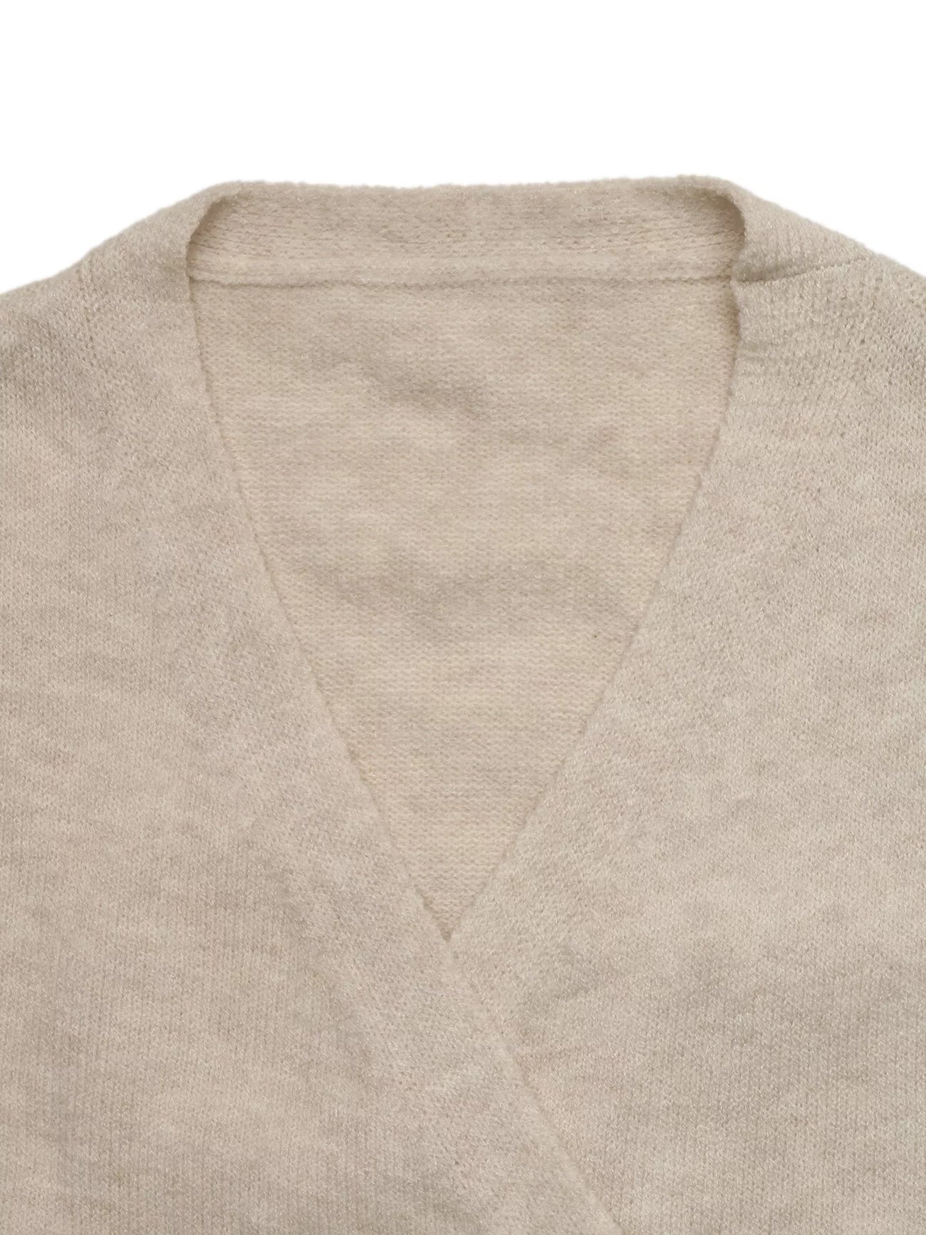 Front view of the Apricot Tied Surplice Long Sleeve Sweater, styled with polished boutique styling for day-to-night outfits, made for women who want easy layering.