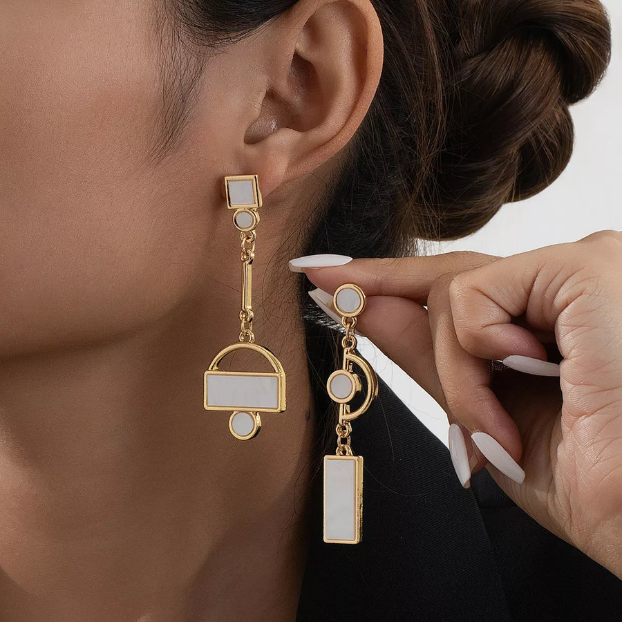 Front view of the Chain Drop Gold Earrings, styled with light-catching shine for workdays, dinners, and gifting, made for women who want lightweight shine.
