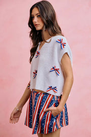 Back view of the OFF WHITE SO ME 4th Of July Ribbon Trimmed Dolman Sweater Top, styled with polished boutique styling for day-to-night outfits, made for women who want easy layering.