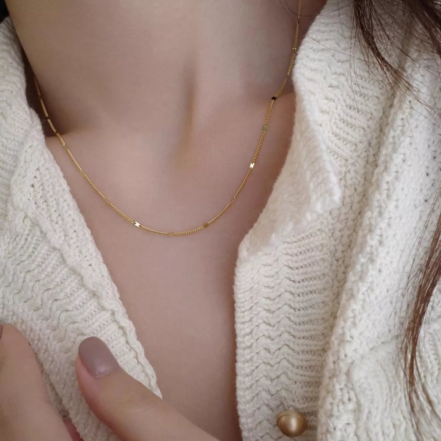 Front view of the Chain Gold Necklace, styled with layered jewelry for everyday styling and gifting, made for women who want refined neckline detail.