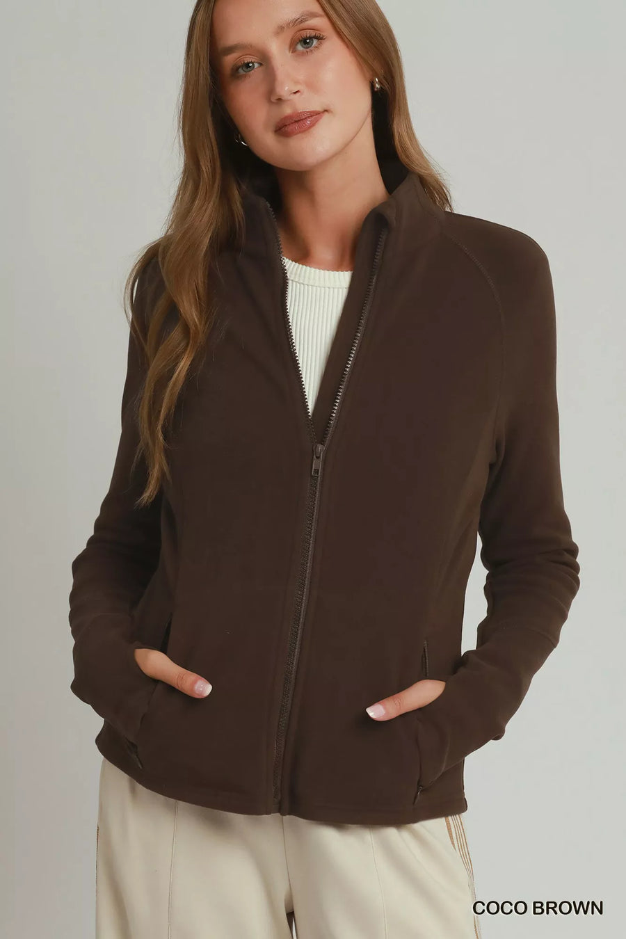 Front view of the COCO BROWN Umgee Soft Fleece Full Zip Jacket With Pockets, styled with polished boutique styling for day-to-night outfits, made for women who want easy layering.