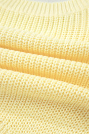 Neckline detail of the Light Yellow Solid Color Cropped Knit Knot Back Cutout Sweater Tank, styled with polished boutique styling for day-to-night outfits, made for women who want easy layering.