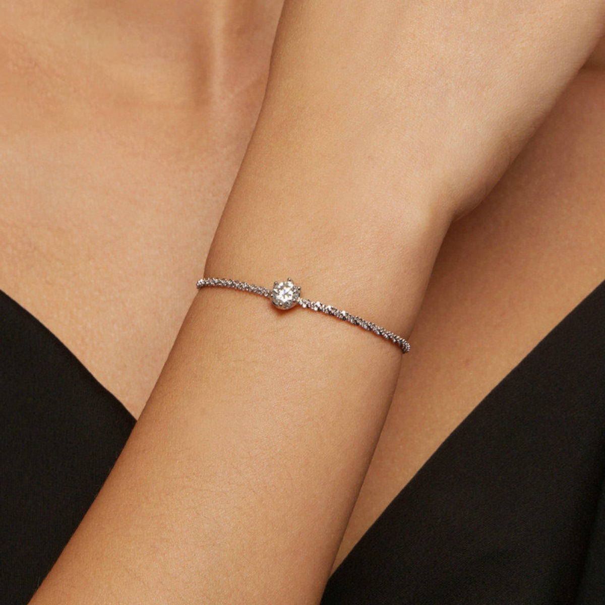 Stacked styling view of the 925 Sterling Silver Zircon Bracelet, styled with soft-shine jewelry for daily outfits and gifting, made for women who want stackable jewelry.