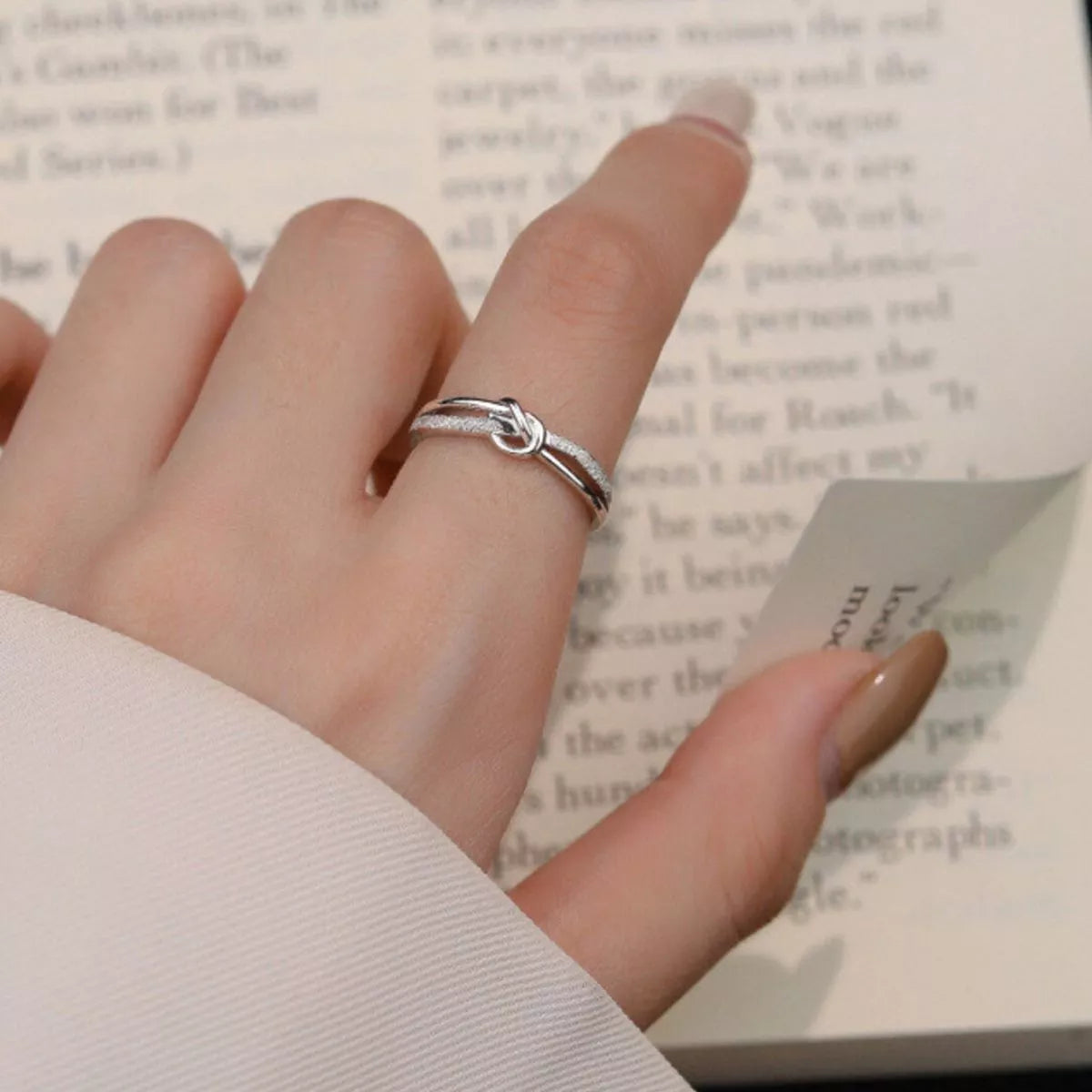 Front view of the Women's Silver Minimalist 925 Sterling Knot Ring for Everyday Styling & Gifting, styled with delicate sparkle for daily wear and gifting, made for women who want refined jewelry.