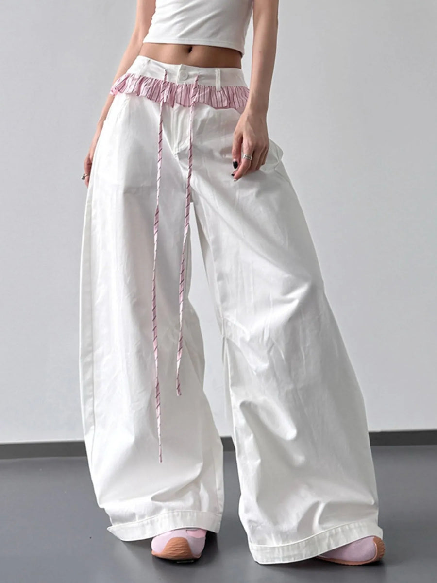 Front view of the White Wide Leg Drawstring Pants, styled with polished comfort for work, travel, and everyday wear, made for women who want repeat outfit options.