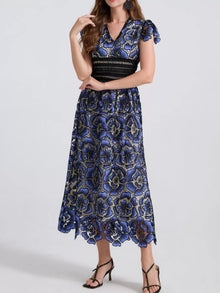 Bundle outfit view of the Blue Women's Elegant Printed V Neck Ruffle Sleeve Midi Dress for Wedding Guest & Evening Wear, styled with feminine boutique styling for dinners, travel, and events, made for women who want elegant styling.