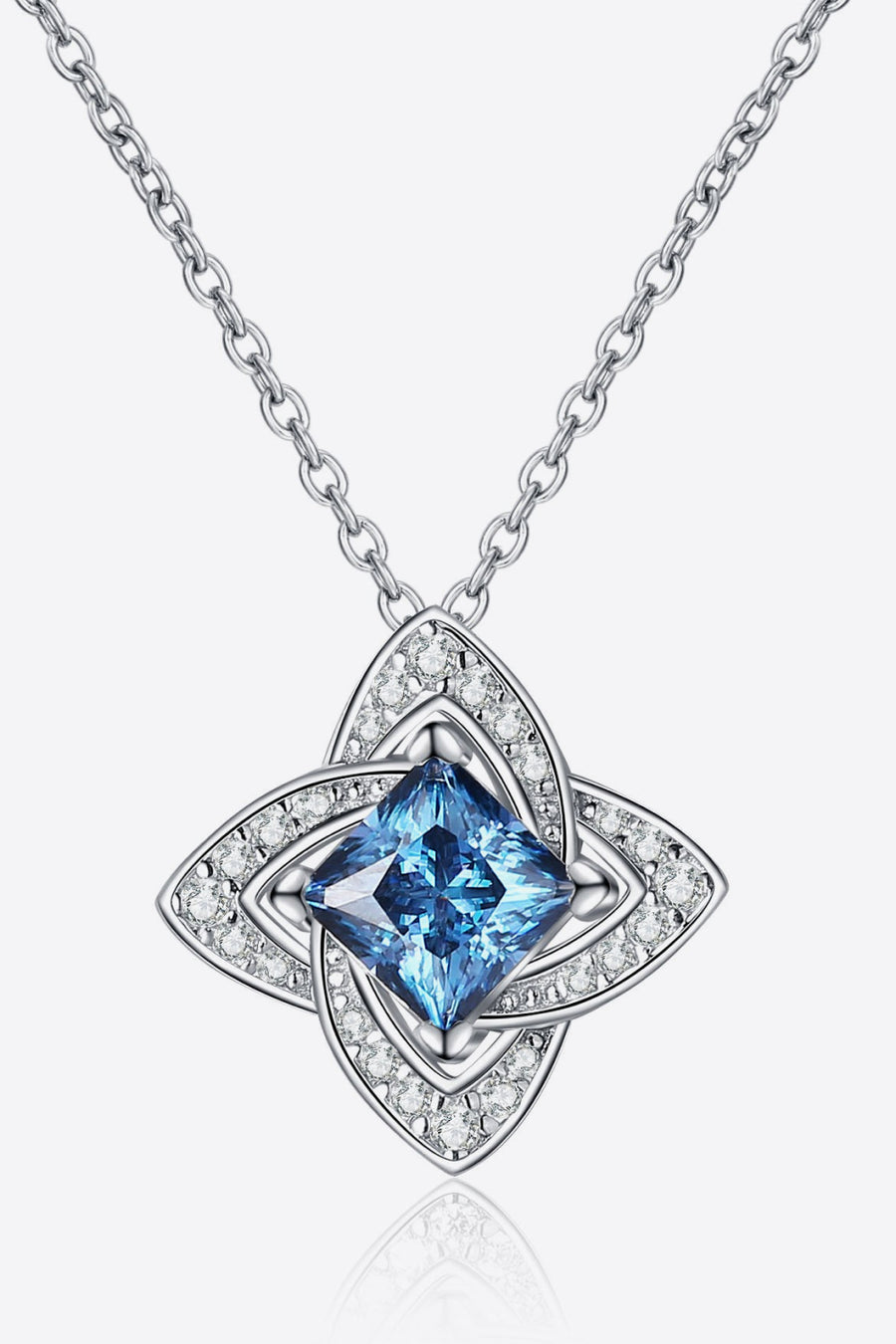 Front view of the Sky Blue Floral Moissanite Necklace, styled with layered jewelry for everyday styling and gifting, made for women who want refined neckline detail.