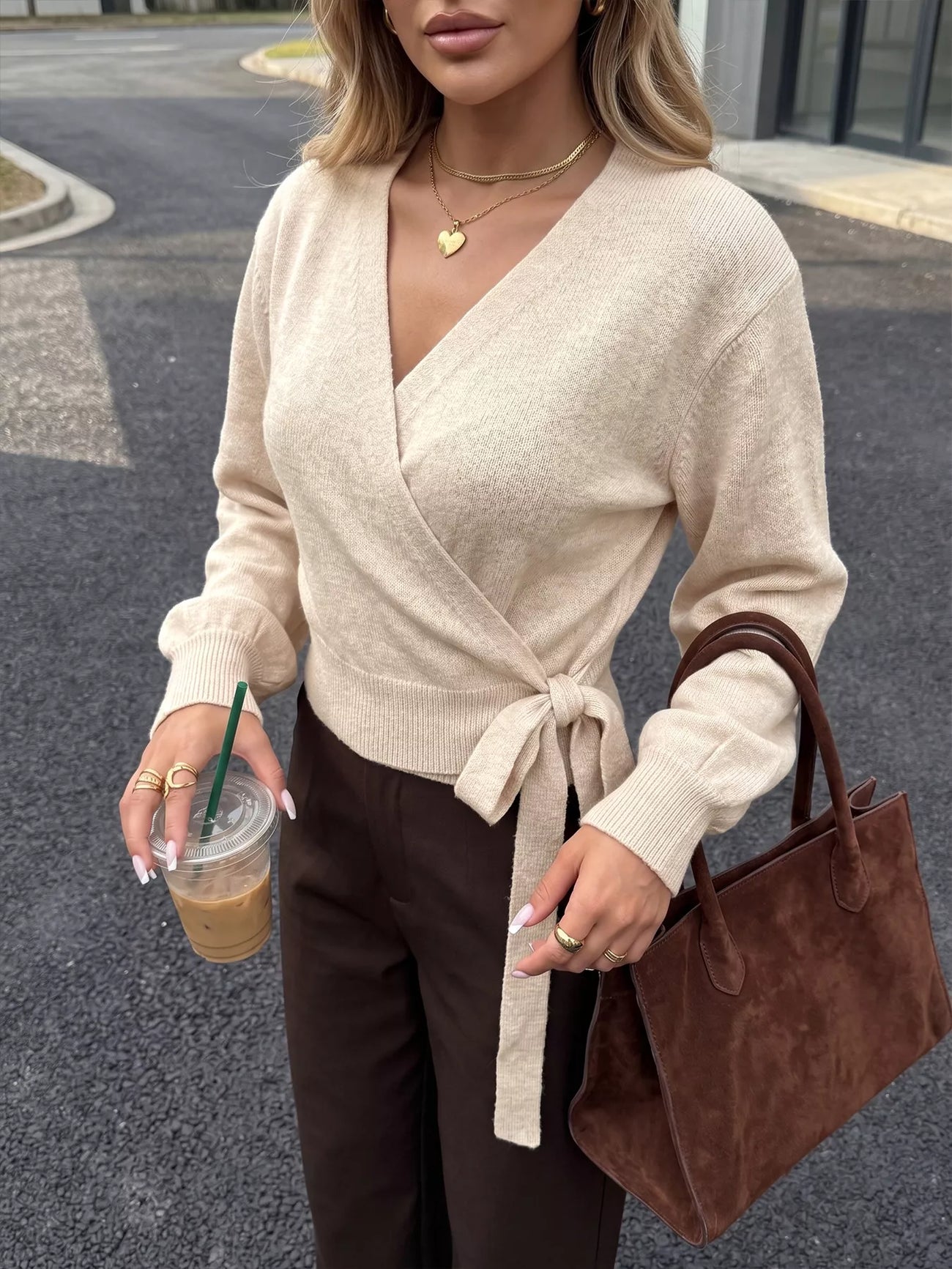 Neckline detail of the Apricot Tied Surplice Long Sleeve Sweater, styled with polished boutique styling for day-to-night outfits, made for women who want easy layering.