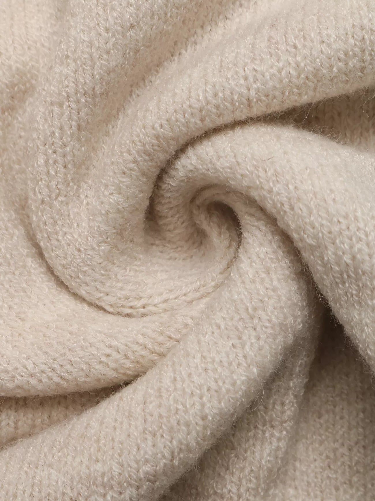 Neckline detail of the Apricot Tied Surplice Long Sleeve Sweater, styled with polished boutique styling for day-to-night outfits, made for women who want easy layering.