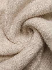 Neckline detail of the Apricot Tied Surplice Long Sleeve Sweater, styled with polished boutique styling for day-to-night outfits, made for women who want easy layering.