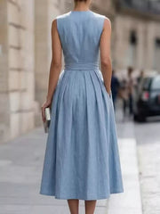 Side view of the Sea blue Full Size Sleeveless Button-Front Belted Midi Dress Plus Size, styled with feminine boutique styling for dinners, travel, and events, made for women who want elegant styling.