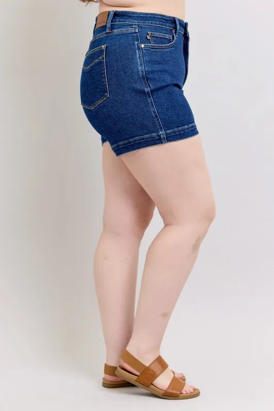 Side view of the DK Judy Blue Full Size High Waist Tummy Control Denim Shorts Plus Size, styled with polished comfort for work, travel, and everyday wear, made for women who want repeat outfit options.