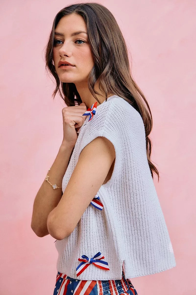Front view of the OFF WHITE SO ME 4th Of July Ribbon Trimmed Dolman Sweater Top, styled with polished boutique styling for day-to-night outfits, made for women who want easy layering.