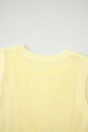 Front view of the Light Yellow Solid Color Cropped Knit Knot Back Cutout Sweater Tank, styled with polished boutique styling for day-to-night outfits, made for women who want easy layering.