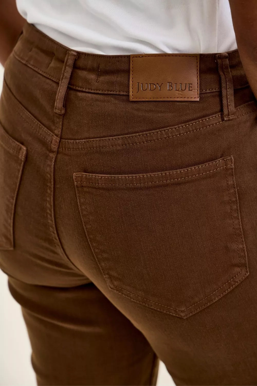 Styled outfit view of the Judy Blue High Waist Aurora Weekender Jeans with Knee Darts C Mahogany, styled with polished boutique styling for day-to-night outfits, made for women who want easy layering.