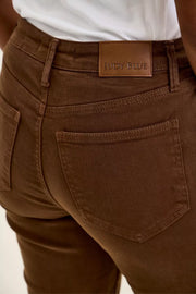 Styled outfit view of the Judy Blue High Waist Aurora Weekender Jeans with Knee Darts C Mahogany, styled with polished boutique styling for day-to-night outfits, made for women who want easy layering.