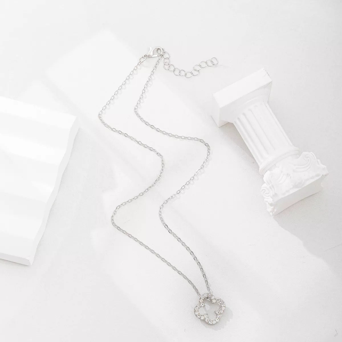 Chain detail of the Silver Women's Lace Minimalist Clover Pendant Necklace for Everyday Styling & Gifting, styled with layered jewelry for everyday styling and gifting, made for women who want refined neckline detail.