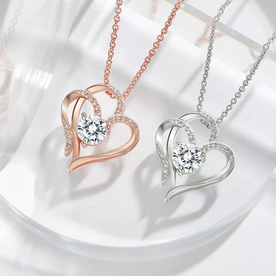 Front view of the Silver Heart Zircon Necklace, styled with layered jewelry for everyday styling and gifting, made for women who want refined neckline detail.