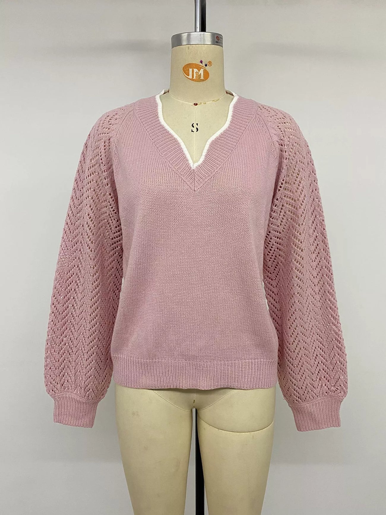 Styled outfit view of the Pink V-Neck Openwork Long Sleeve Sweater, styled with polished boutique styling for day-to-night outfits, made for women who want easy layering.