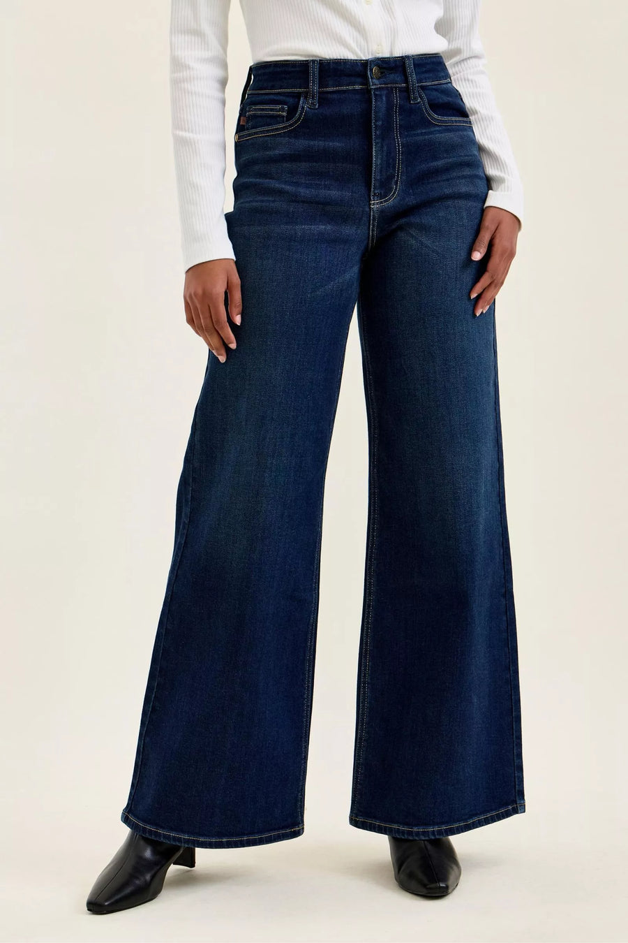 Front view of the DK Women's Elegant Judy Blue High-Waisted Wide-Leg Dark Jeans for Office & Everyday Wear, styled with polished boutique styling for day-to-night outfits, made for women who want easy layering.
