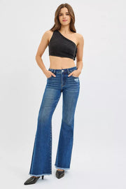 Fabric detail of the DARK RISEN High Rise Flare Jeans, styled with polished boutique styling for day-to-night outfits, made for women who want easy layering.