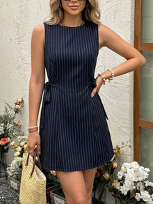 Bundle outfit view of the Navy Blue Women's Elegant Striped Sleeveless Tie Waist Dress for Wedding Guest & Evening Wear, styled with feminine boutique styling for dinners, travel, and events, made for women who want elegant styling.