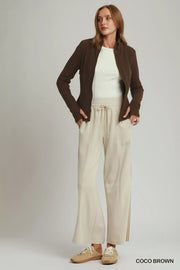 Styled outfit view of the COCO BROWN Umgee Soft Fleece Full Zip Jacket With Pockets, styled with polished boutique styling for day-to-night outfits, made for women who want easy layering.