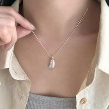 Bundle outfit view of the Silver Women's Lace Minimalist Feather Pendant Necklace for Everyday Styling & Gifting, styled with layered jewelry for everyday styling and gifting, made for women who want refined neckline detail.