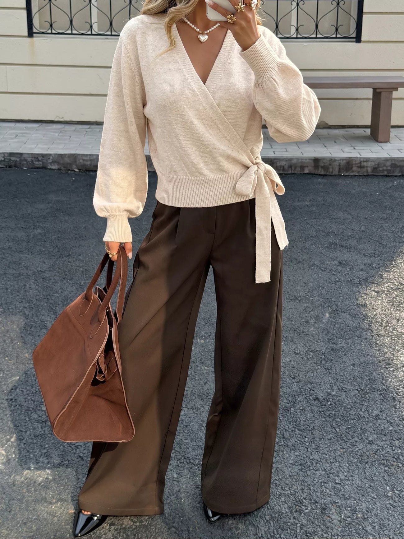 Fabric detail of the Apricot Tied Surplice Long Sleeve Sweater, styled with polished boutique styling for day-to-night outfits, made for women who want easy layering.