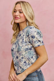 Front view of the BLUE SO ME Floral Print Short Sleeves Sweater Knit Top, styled with polished comfort for work, travel, and everyday wear, made for women who want repeat outfit options.