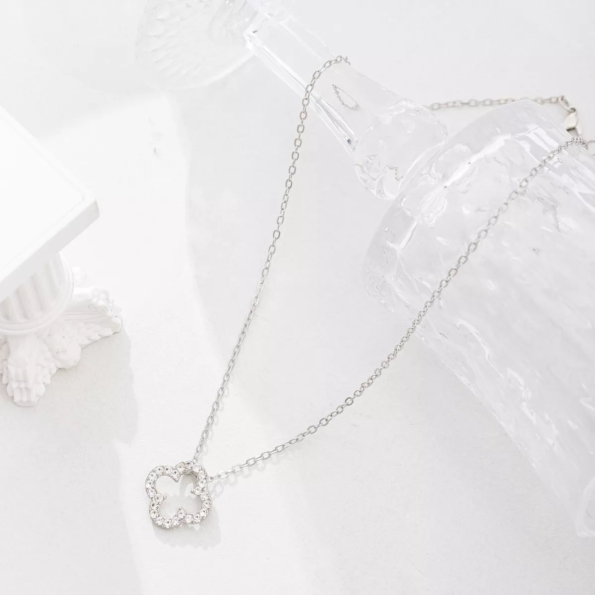 Pendant close-up of the Silver Women's Lace Minimalist Clover Pendant Necklace for Everyday Styling & Gifting, styled with layered jewelry for everyday styling and gifting, made for women who want refined neckline detail.