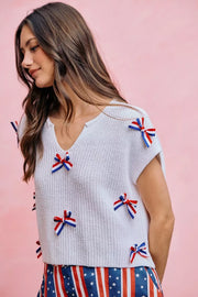 Back view of the OFF WHITE SO ME 4th Of July Ribbon Trimmed Dolman Sweater Top, styled with polished boutique styling for day-to-night outfits, made for women who want easy layering.