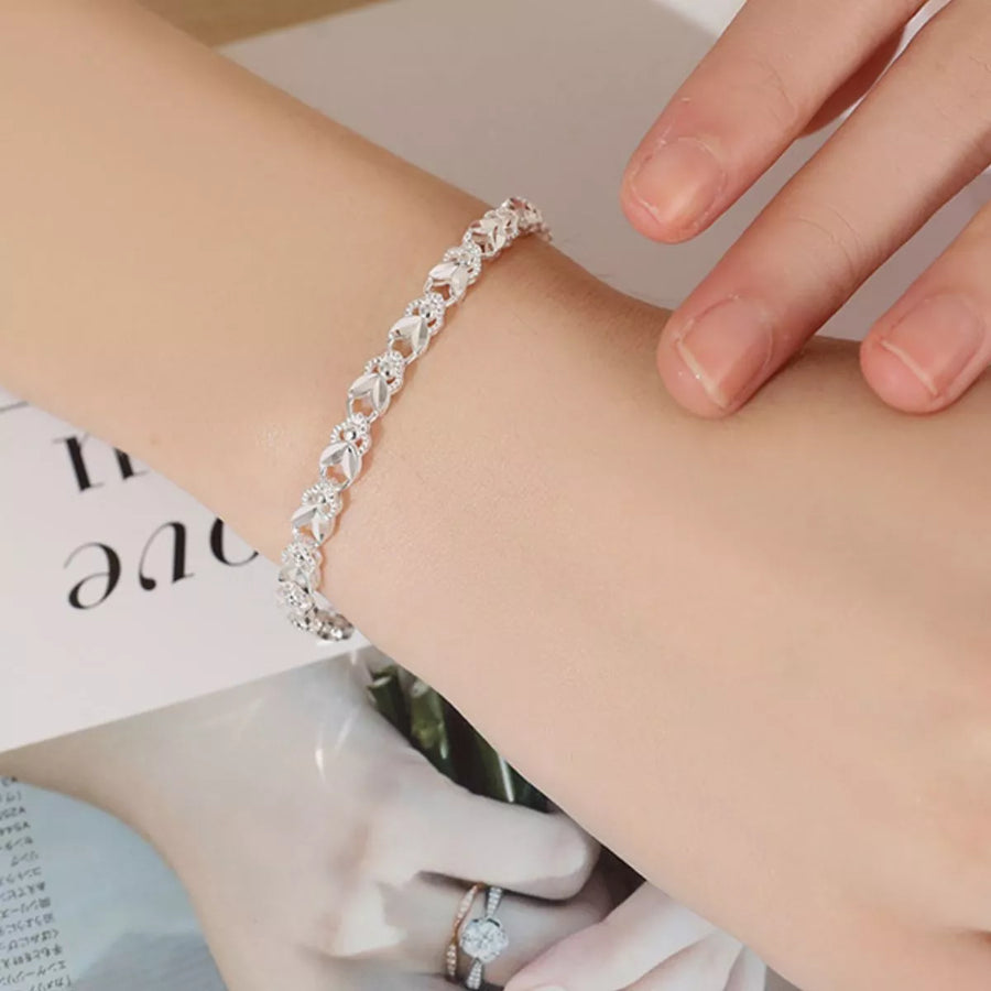 Front view of the Silver Chain Bracelet, styled with soft-shine jewelry for daily outfits and gifting, made for women who want stackable jewelry.