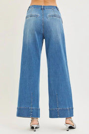Styled outfit view of the MEDIUM RISEN Slouchy Wide Leg Jeans With Pleats, styled with polished boutique styling for day-to-night outfits, made for women who want easy layering.