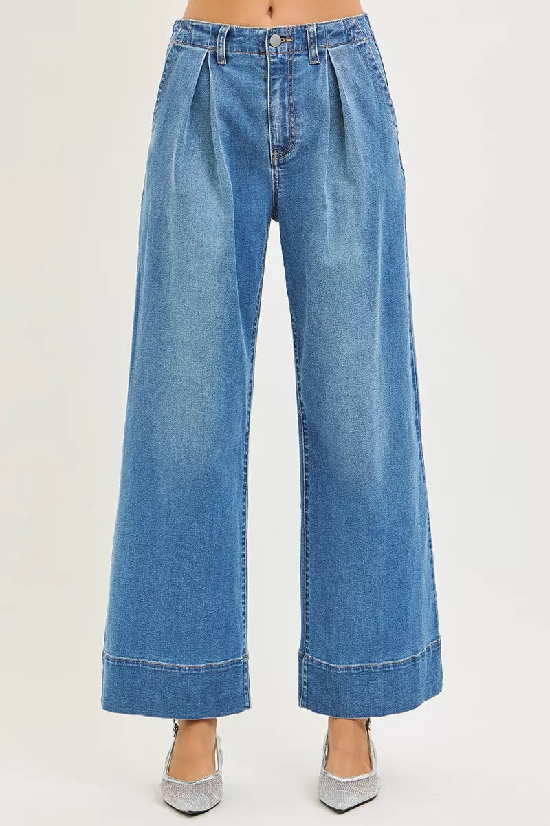 Back view of the MEDIUM RISEN Slouchy Wide Leg Jeans With Pleats, styled with polished boutique styling for day-to-night outfits, made for women who want easy layering.